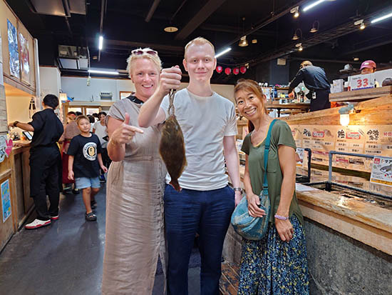 Mother and son and guide in Tokyo