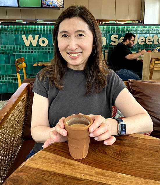 woman drinking coffee at a coffee house